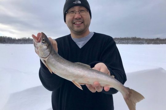 Fairbanks Ice Fishing Expedition in a Heated Cabin with Fish Cookout