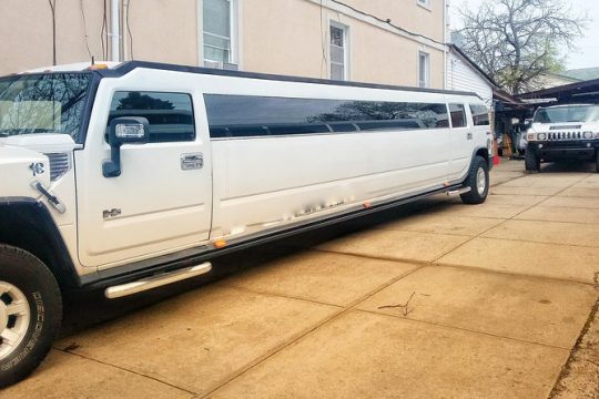 Woodbury Commons Shopping in H2 Hummer White Limousine