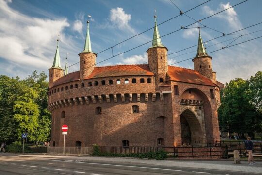 A glance at the Krakow Old Town from the deck of a electric golf cart